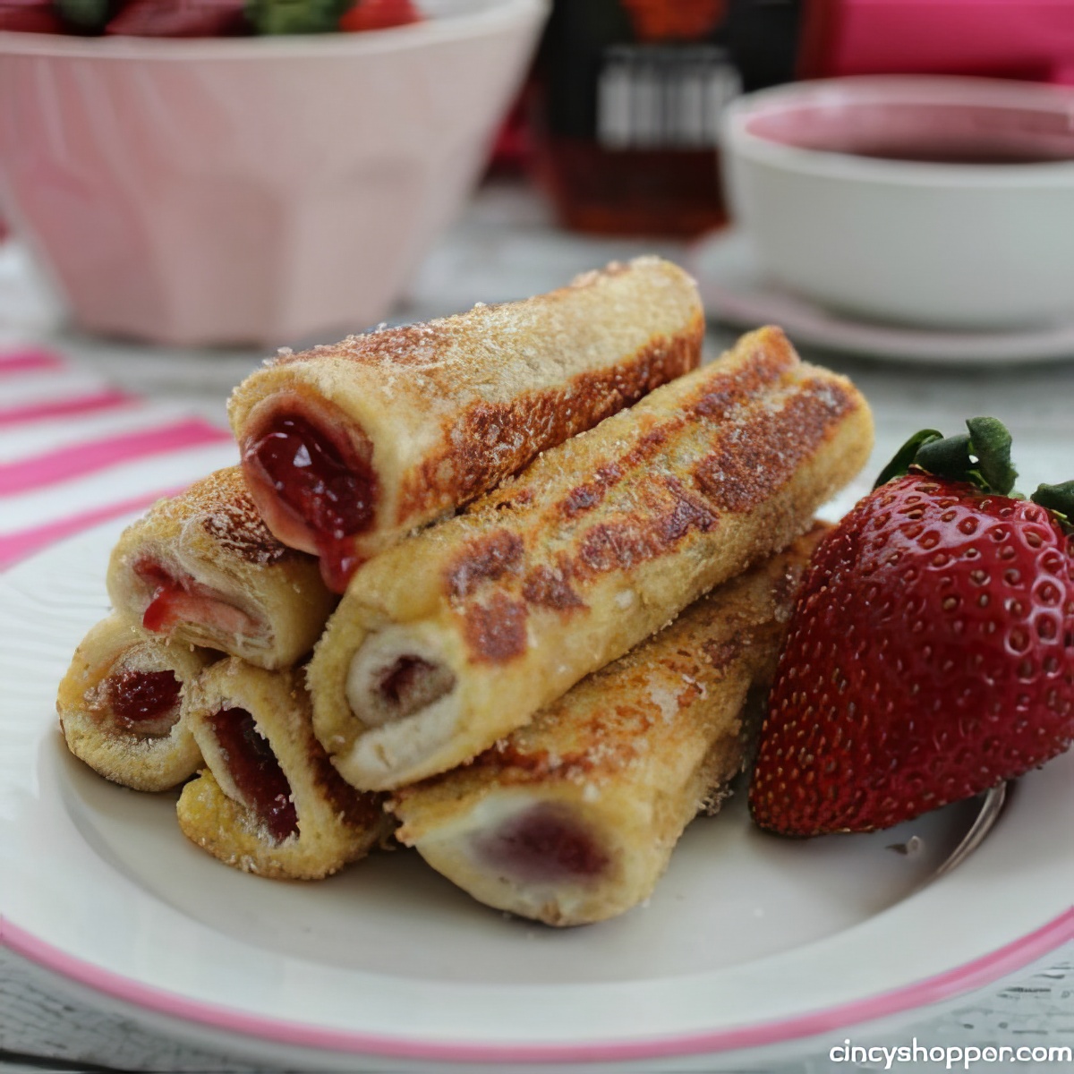 Have fun doing this super yummy and easy French Toast Roll Ups with your kids for breakfast!