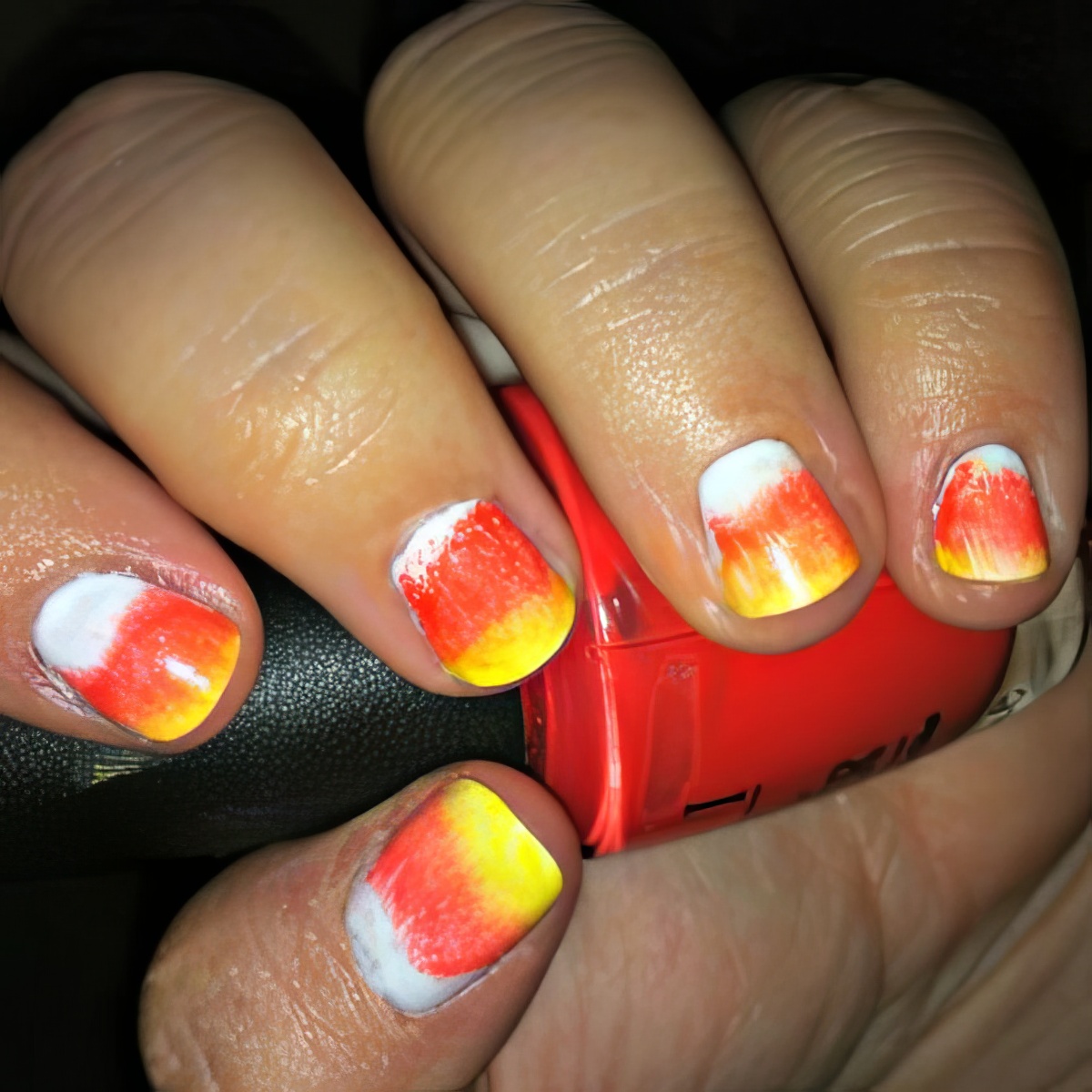 Get stripes and candy corn nails design this Halloween with the girls!