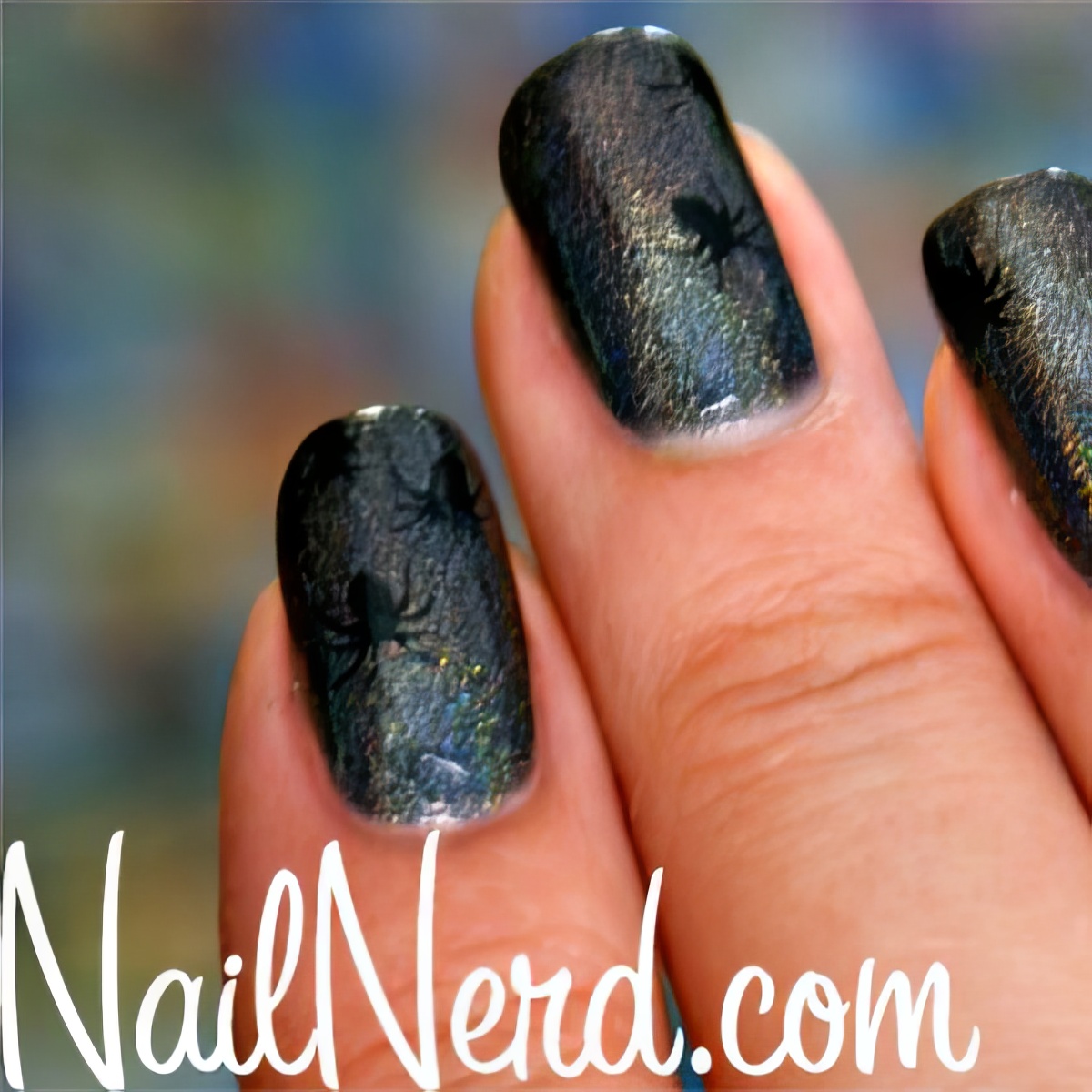 Go bold and black with these black nail design this Halloween!