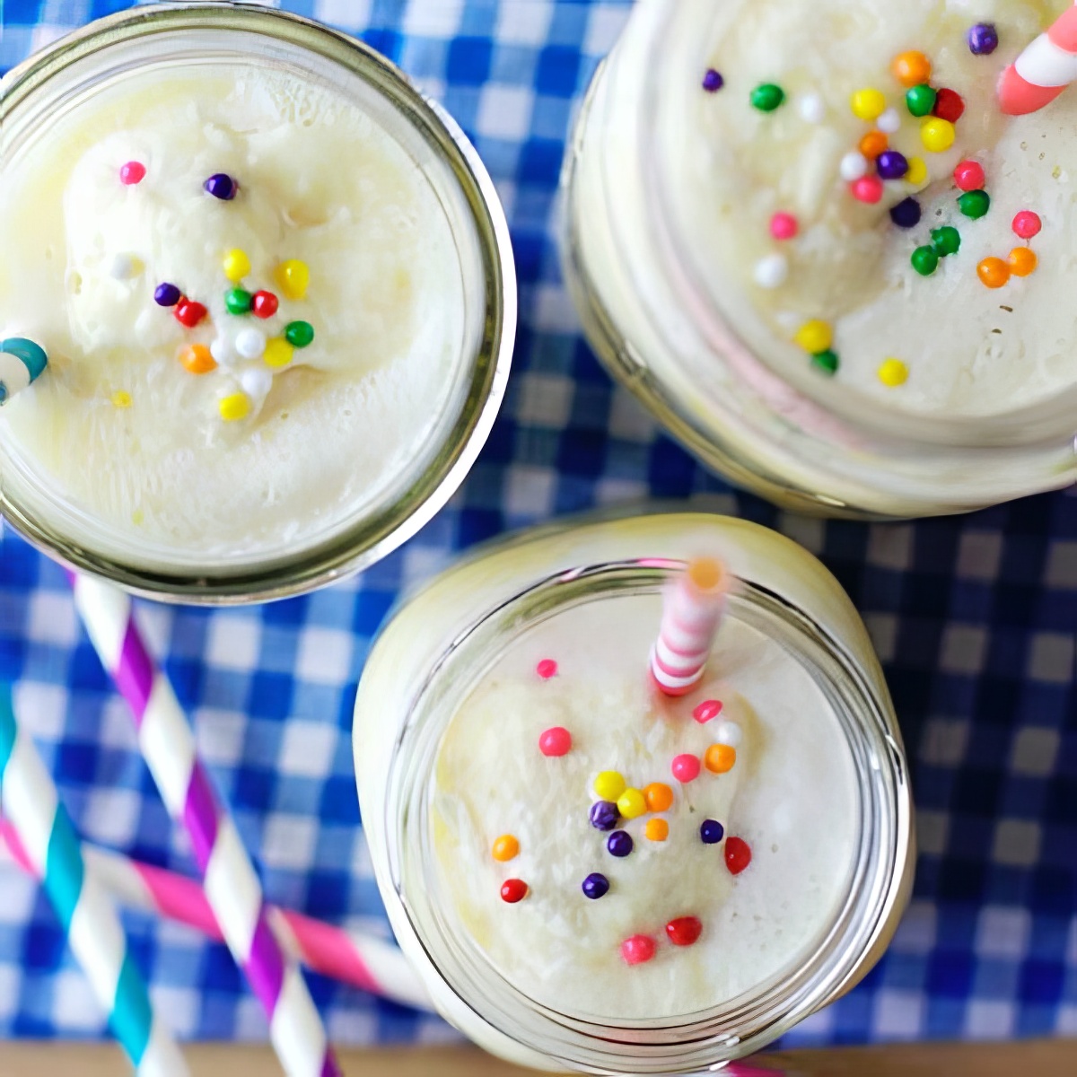 pineapple drink with fancy straws and sprinkles, afternoon froth
