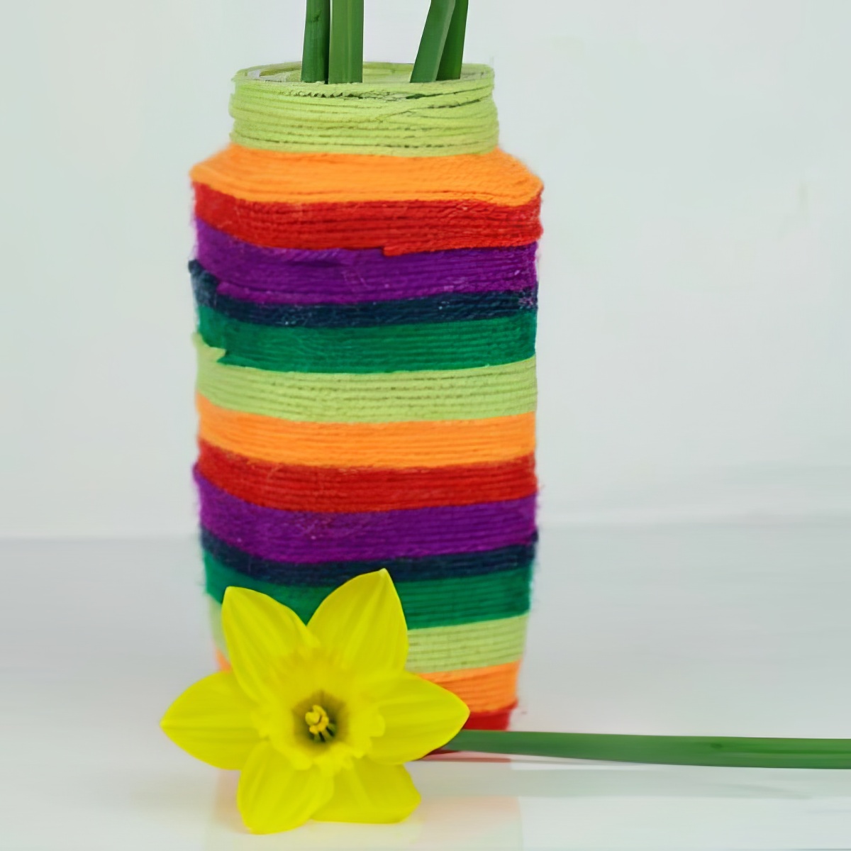 wool vase colorful yarns crafted into a vase by kids