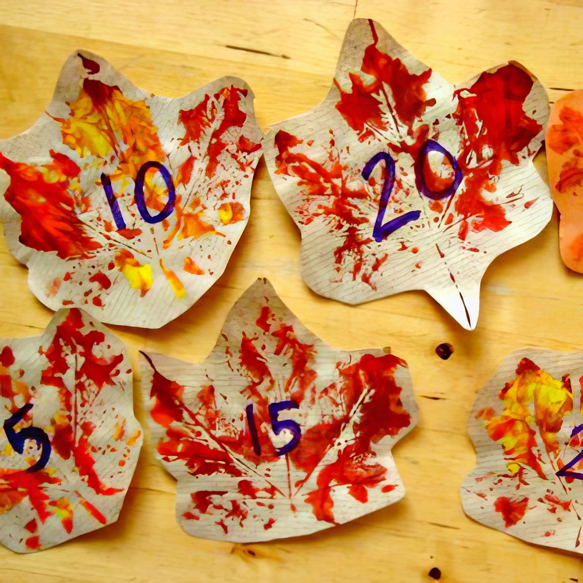 leaf math, 13-leafy-crafts-and-activities-for-kids, creative leaf crafts for kids
