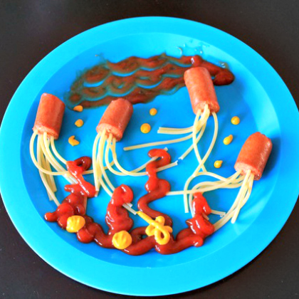 squid lunch - cut hotdogs with spaghetti as quid tentacles and ketchup and mustard to complete the look