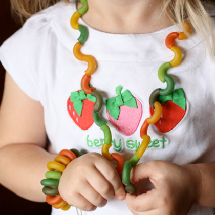 pasta jewelry - dyed elbow macaroni pasta stringed together to form a necklace and bracelet