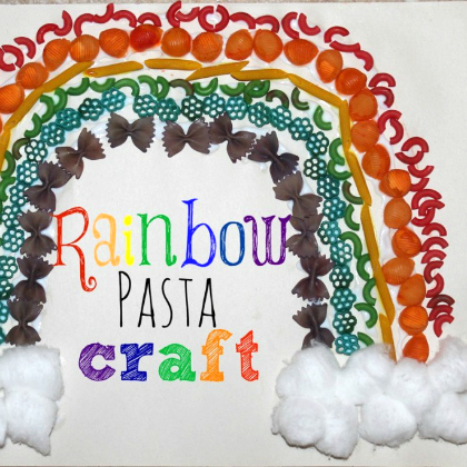 rainbow pasta craft - different colors and shapes of pasta forming a rainbow with cotton on each end