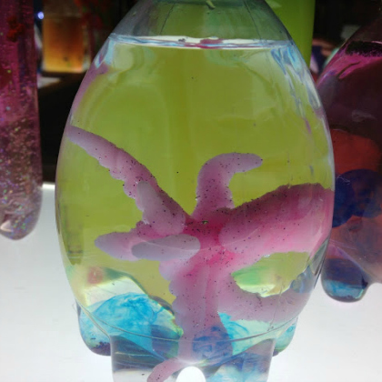 growing sea life character in a bottle. Sea Character Discovery Bottle. Sensory Bottle