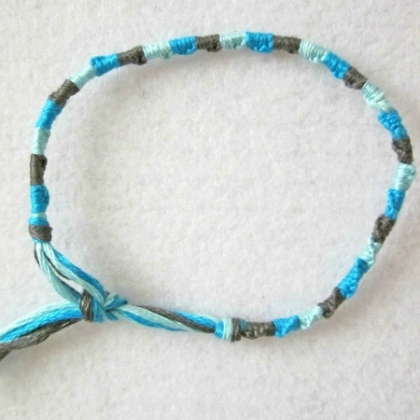 knotted friendship bracelet - blue green and gray color