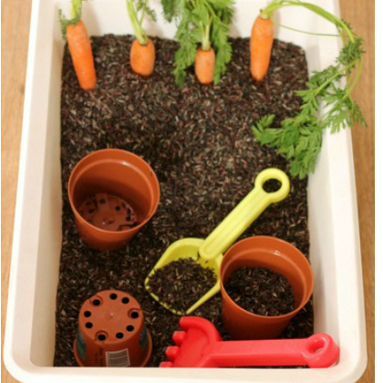 Spring Sensory Play Tub with Carrots with the kids!