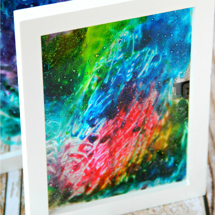 colorful galaxy stained glass made with glitter glue