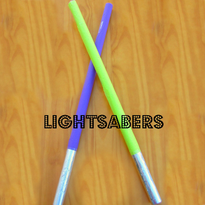 wrapping paper roll light sabers, Out of This World Star Wars Crafts for Kids