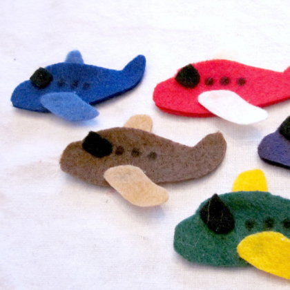 felt finger airplane puppets as paper plane crafts for kids