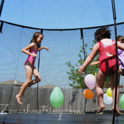Balloons popping on a trampoline. Balloon games for kids