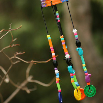 DIY Colored Beaded Chime Crafts for Kids made of plastic water bottle, beads, strings and buttons