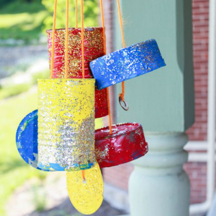 DIY Cans and Lids Wind Chime Crafts for Kids splattered with paints