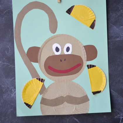 cupcake liner monkey craft with blue and yellow
