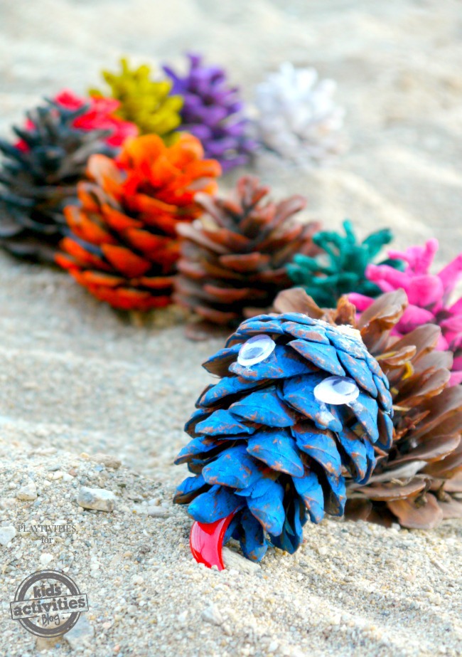 pine cone snake craft (finished) on sand