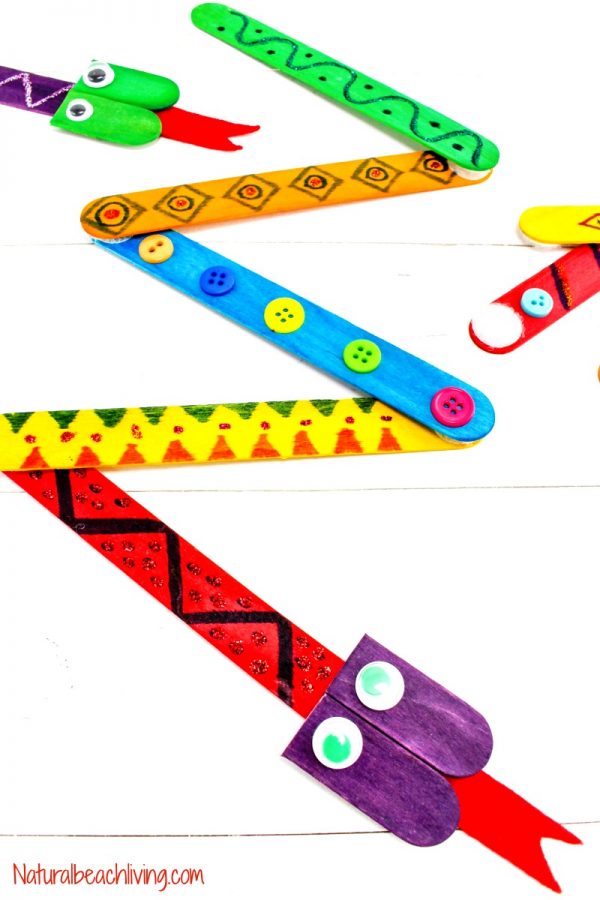 popsicle stick snake craft with different colorful patterns