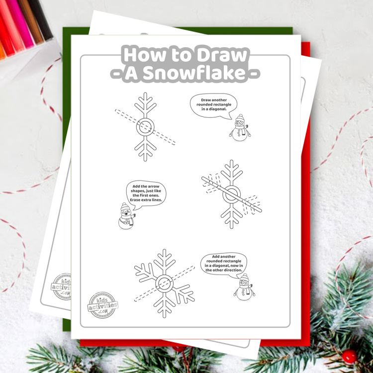 How to Draw a Snowflake Tutorial from Kids Activities Blog - Play Ideas - snowflake drawing printed pdf lesson shown on fake snow and greenery